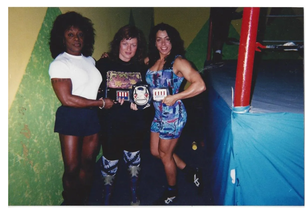 Sandy, Liz Chase, and Angel Orsini from left to right